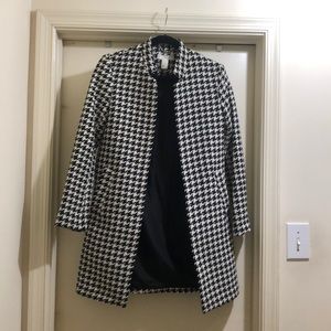 Houndstooth trench jacket.
